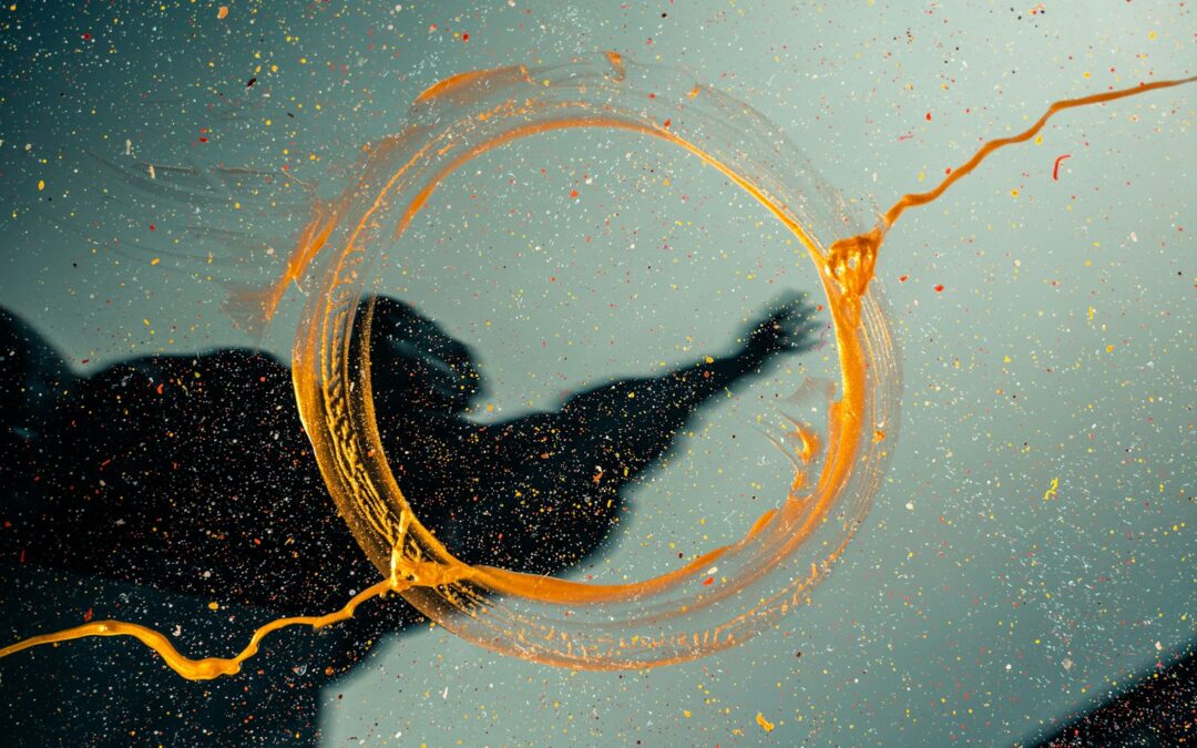 a person's shadow with a yellow string in the air